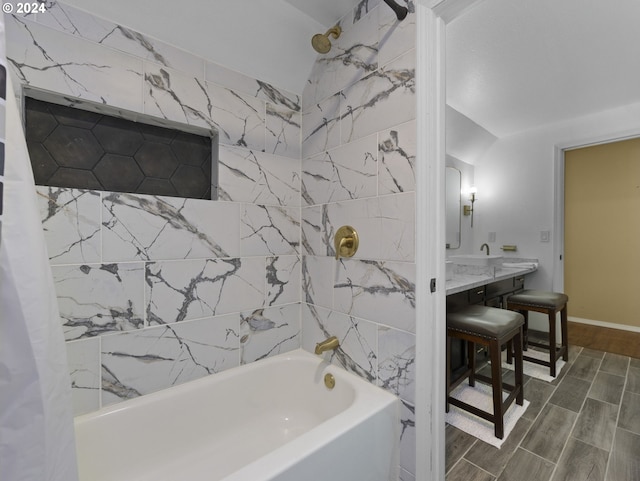 bathroom featuring wood-type flooring and shower / bathtub combination with curtain