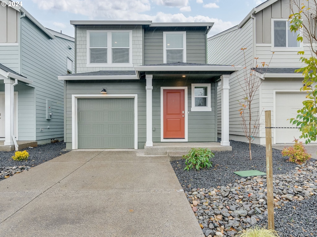 view of front of property with a garage