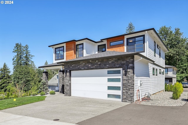 view of front of property with a garage