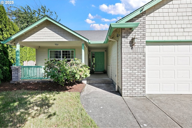 1157 Yew St, Junction City, OR 97448 - doorway to property with a garage, a porch, and driveway