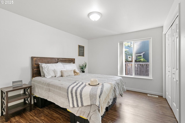 1157 Yew St, Junction City, OR 97448 - bedroom featuring wood finished floors, a closet, and baseboards