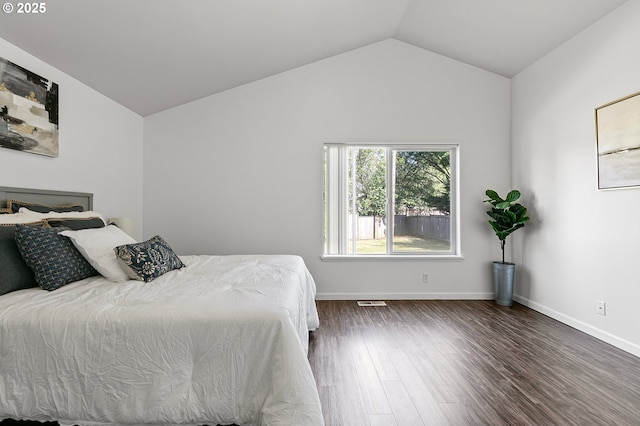 1157 Yew St, Junction City, OR 97448 - bedroom featuring dark wood-type flooring, vaulted ceiling, and baseboards