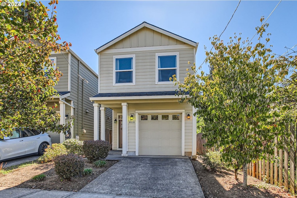 front of property with a garage