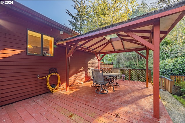 wooden deck featuring a gazebo