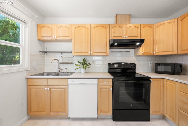 kitchen featuring tasteful backsplash, black appliances, sink, crown molding, and light brown cabinets