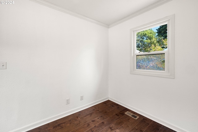 unfurnished room with crown molding and wood-type flooring