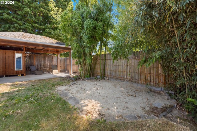 view of yard featuring a gazebo and a patio