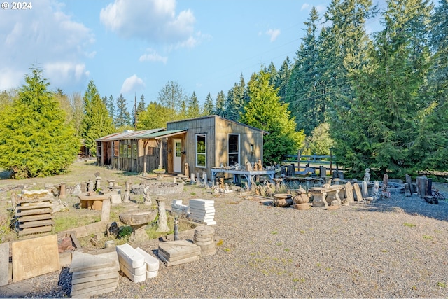 2201 NW Carty Rd, Ridgefield, WA 98642 - rear view of property with an outdoor structure