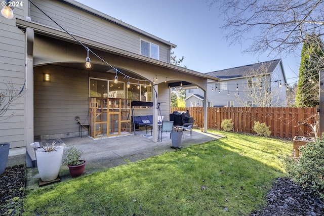 view of yard featuring a patio area and fence