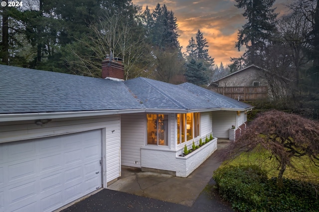 ranch-style home with a garage