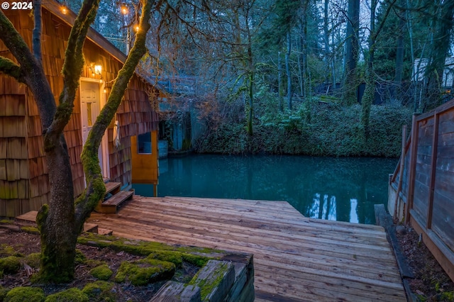 view of dock with a water view