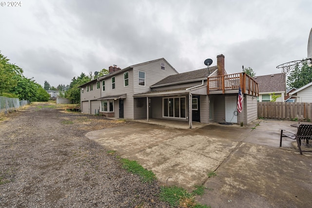 rear view of property with a patio area