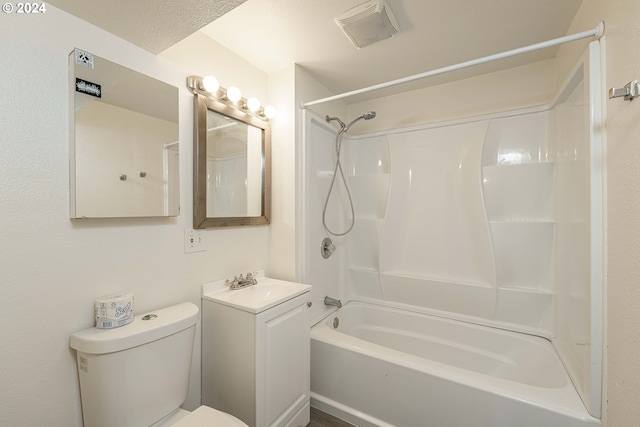 full bathroom featuring vanity, shower / washtub combination, and toilet