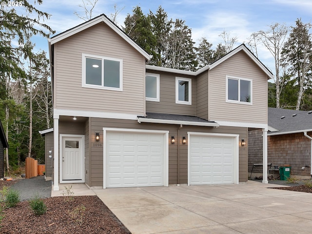 view of front of property featuring a garage