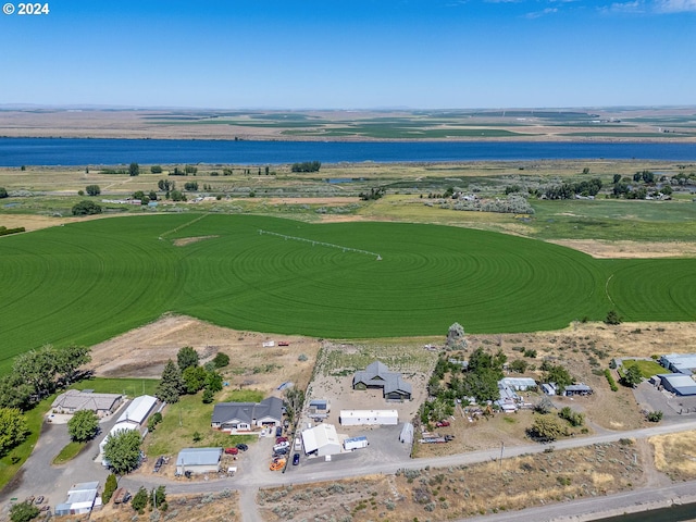 bird's eye view with a rural view and a water view