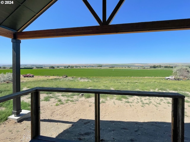 view of yard with a rural view