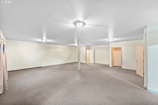 basement with a textured ceiling