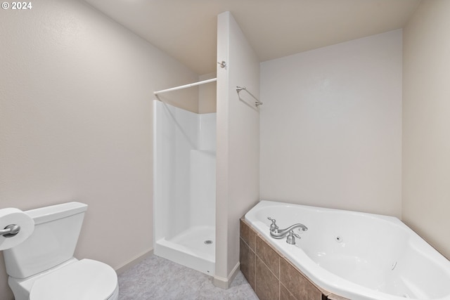 bathroom featuring separate shower and tub, toilet, and tile patterned floors