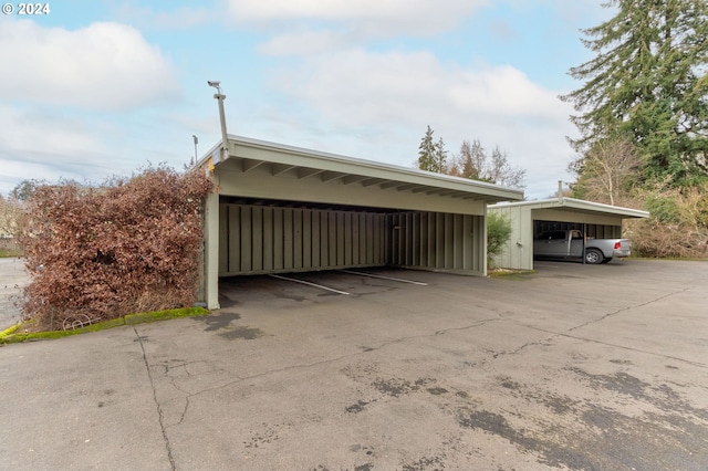 garage with a carport