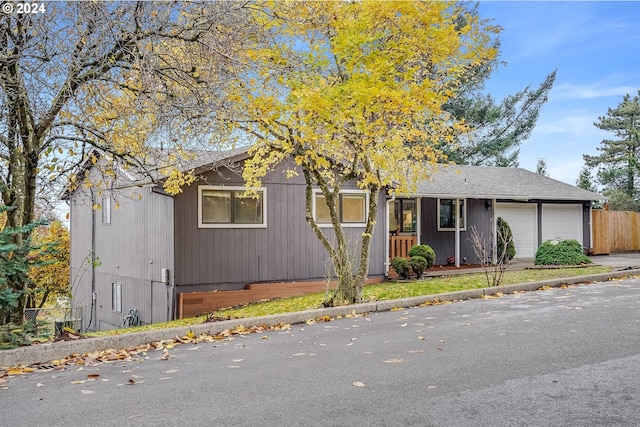 view of front of property featuring a garage