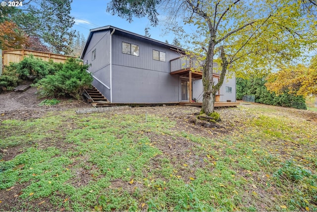 rear view of property with a deck