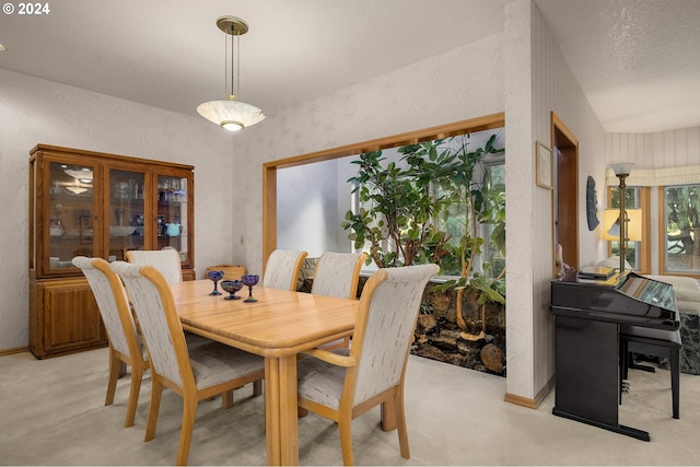 22750 SW Rosedale Rd, Beaverton, OR 97078 - dining room with a textured wall, light colored carpet, and a textured ceiling