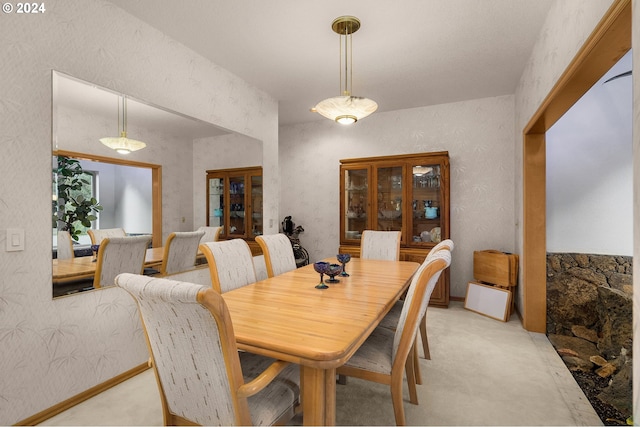 22750 SW Rosedale Rd, Beaverton, OR 97078 - dining room featuring baseboards and light carpet