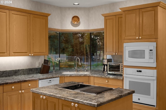 22750 SW Rosedale Rd, Beaverton, OR 97078 - kitchen with a sink, a center island, and white appliances