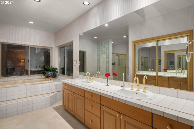 22750 SW Rosedale Rd, Beaverton, OR 97078 - bathroom featuring a stall shower, double vanity, a sink, and a garden tub