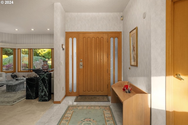 22750 SW Rosedale Rd, Beaverton, OR 97078 - entryway featuring baseboards, wallpapered walls, and recessed lighting