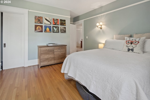 bedroom with light hardwood / wood-style flooring