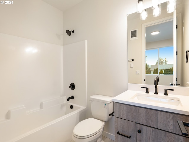 full bathroom featuring shower / washtub combination, vanity, and toilet