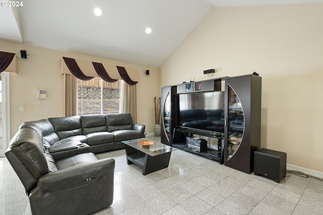 living room featuring high vaulted ceiling