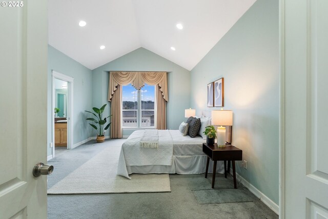 carpeted bedroom with vaulted ceiling and multiple windows