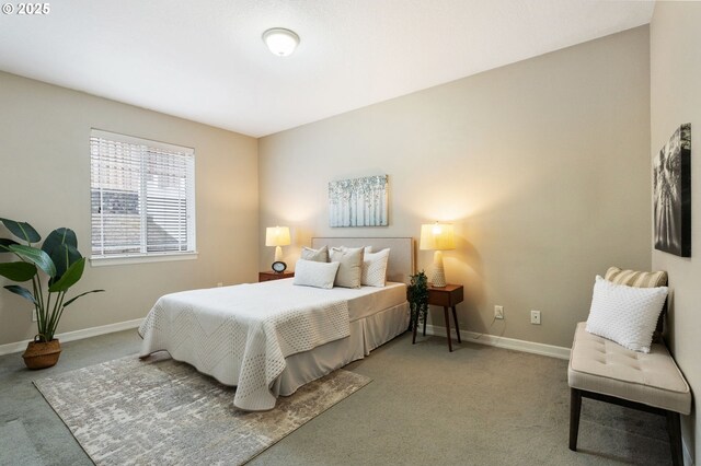 bedroom with light colored carpet