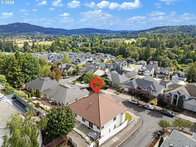 drone / aerial view featuring a mountain view