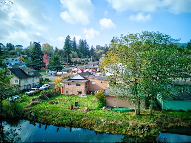 bird's eye view with a water view