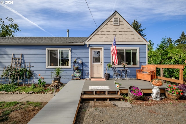 view of front of home with a wooden deck