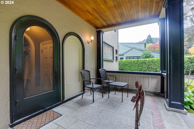 1709 NW Aspen Ave, Portland, OR 97210 - sunroom / solarium featuring arched walkways