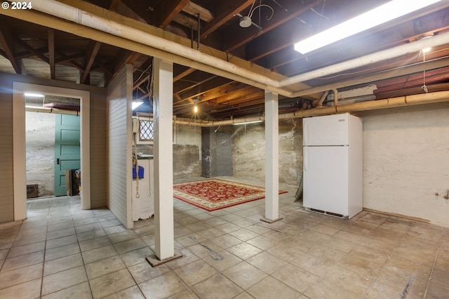 1709 NW Aspen Ave, Portland, OR 97210 - unfinished below grade area featuring freestanding refrigerator