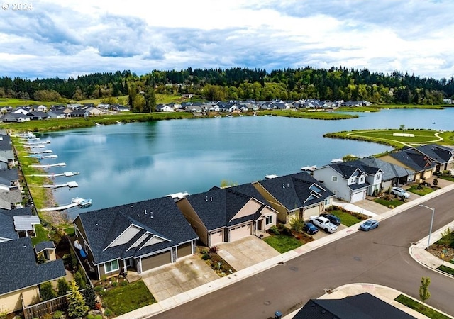 drone / aerial view with a water view