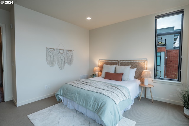 carpeted bedroom with recessed lighting and baseboards