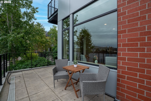 view of patio with a balcony