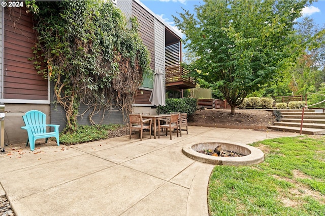 view of patio / terrace with a balcony