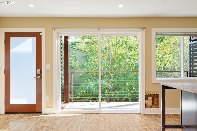 doorway featuring light hardwood / wood-style floors