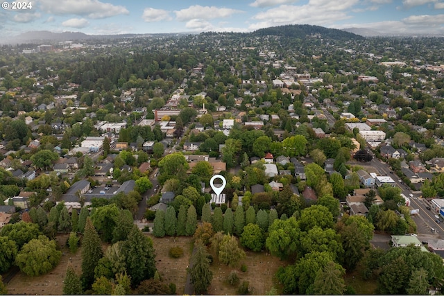 drone / aerial view featuring a mountain view