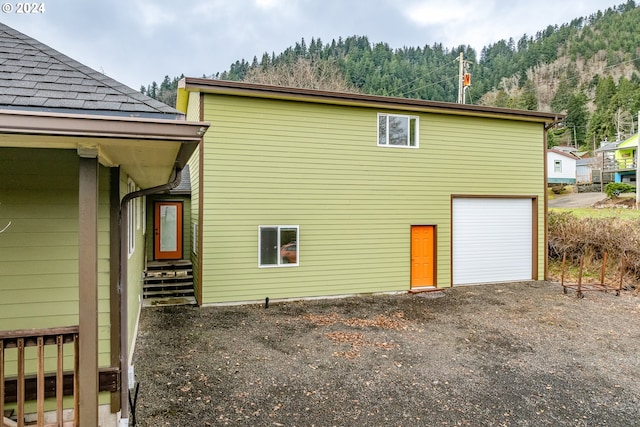 view of home's exterior with a garage