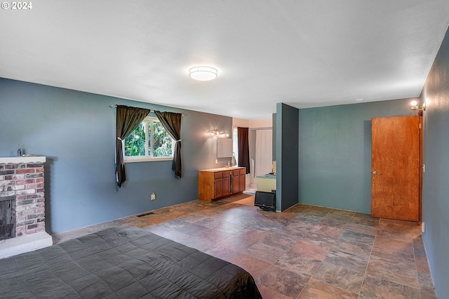 bedroom with a fireplace