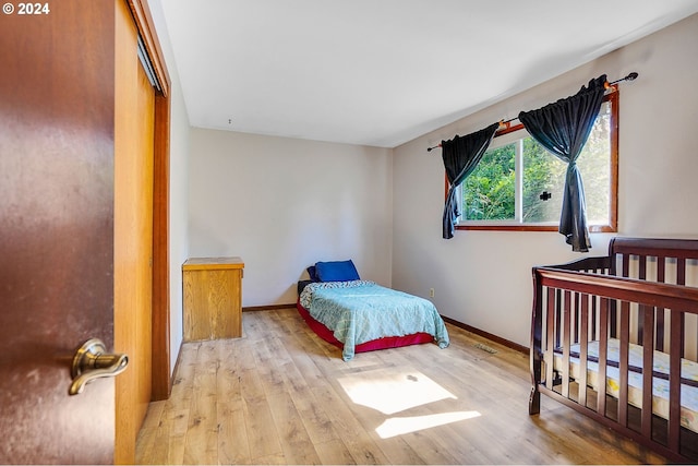 bedroom featuring light hardwood / wood-style floors