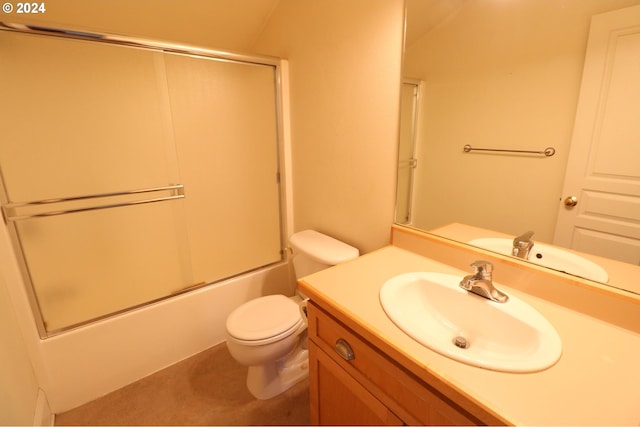 full bathroom with vanity, enclosed tub / shower combo, and toilet